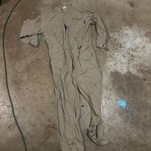 tan jump suit